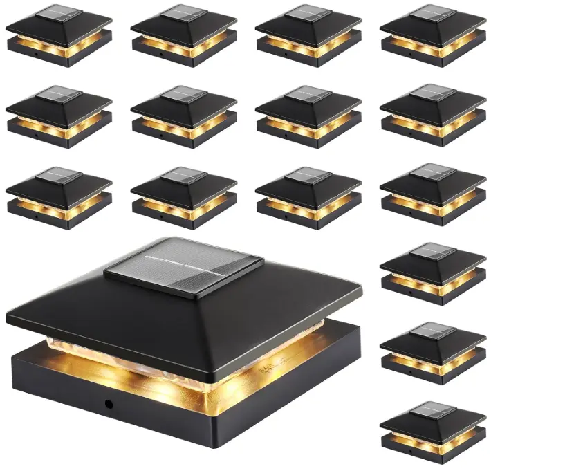 Black solar post cap lights with warm-white illumination, shown as a multipack